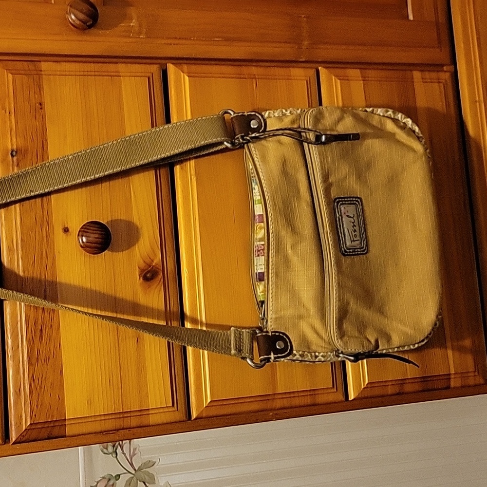 Canvas crossbody handbag.couple of marks on the fabric as seen in picture #3